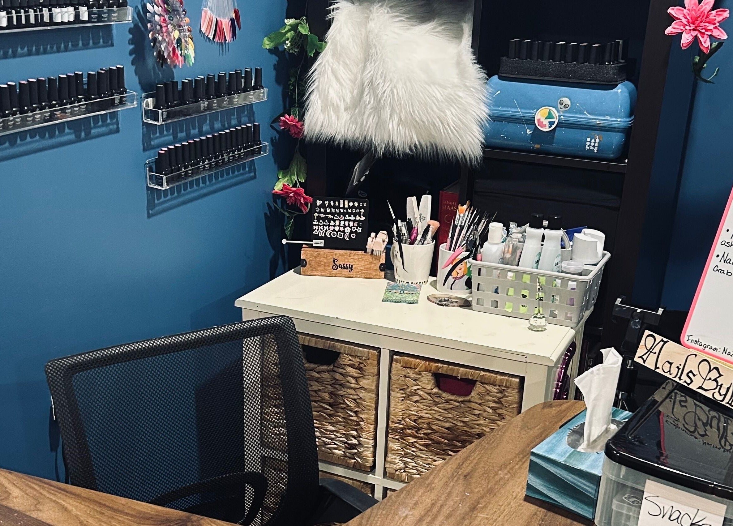 Chic nail studio at Nailss.ByKeira, Ottawa, Ontario, CA, featuring a stylish workstation with nail polish displays.