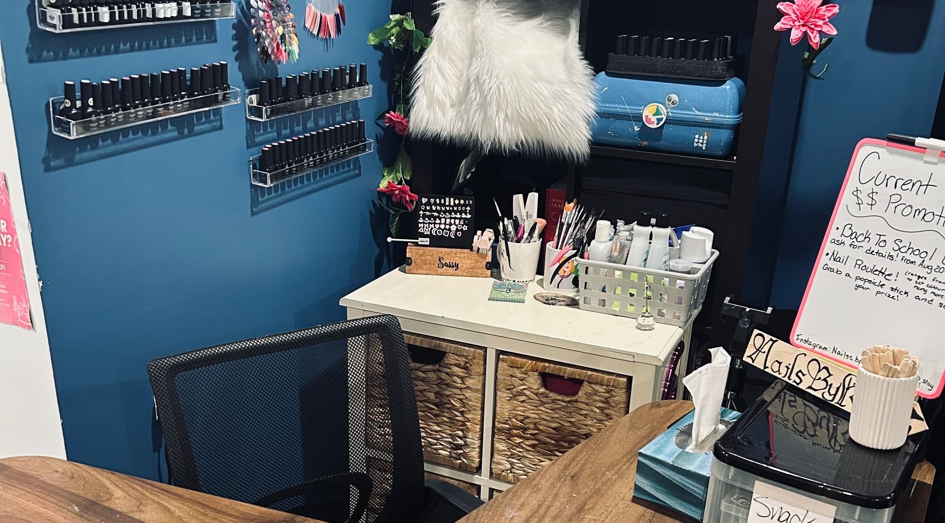 Chic nail studio at Nailss.ByKeira, Ottawa, Ontario, CA, featuring a stylish workstation with nail polish displays.