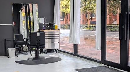 Modern salon interior at Sanctum Studio Perth, Subiaco, Western Australia, AU, showcasing sleek styling chairs.
