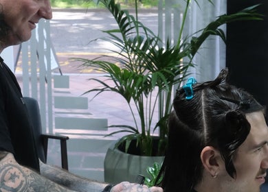 Stylist at Sanctum Studio Perth giving a haircut in Subiaco, Western Australia, AU.