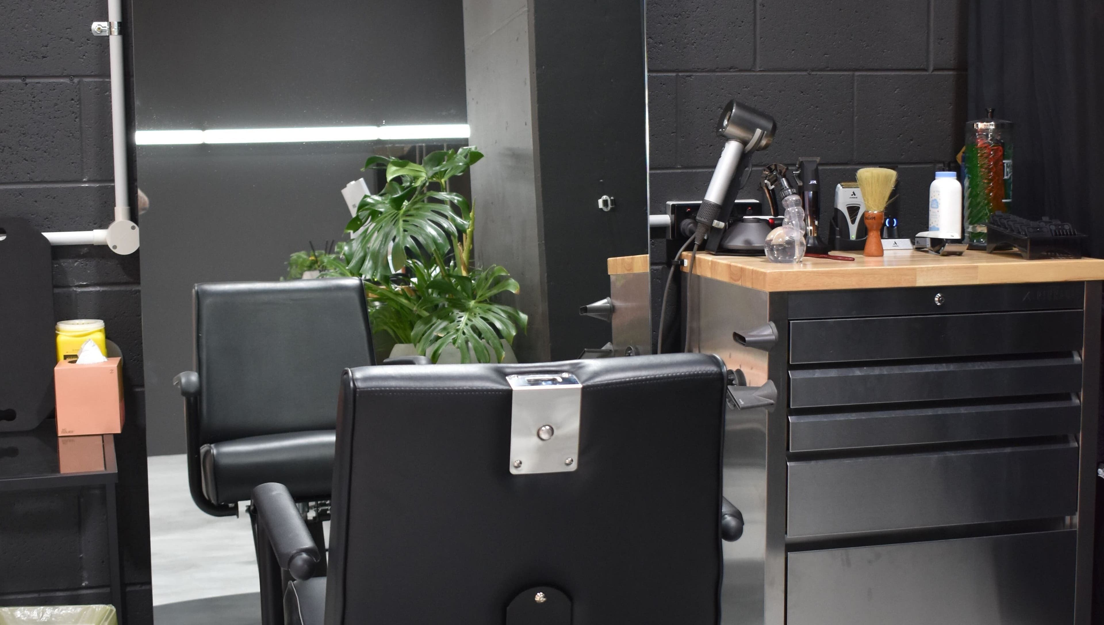 A modern salon chair and styling station at Sanctum Studio Perth in Subiaco, Western Australia, AU.