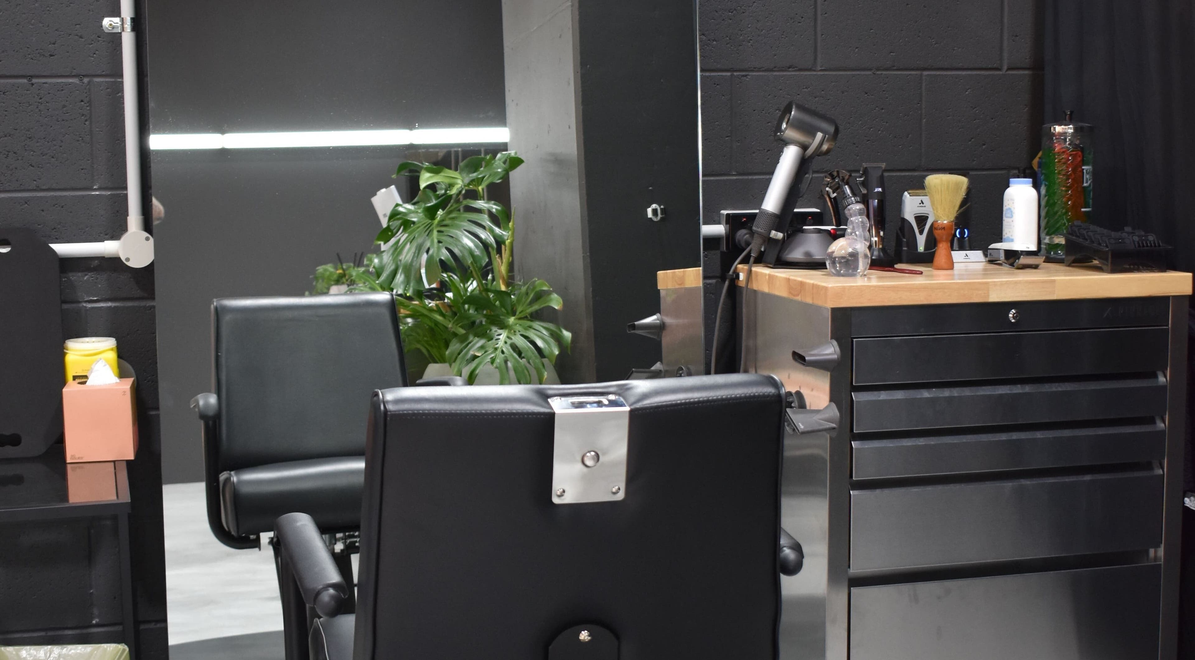 A modern salon chair and styling station at Sanctum Studio Perth in Subiaco, Western Australia, AU.