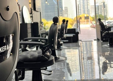 Modern barber chairs and sleek design at Shaker & Co, Dubai, Dubai, AE beauty and wellness venue.