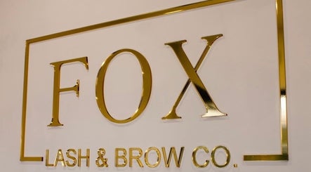Elegant golden sign at Fox Lash & Brow Co, located in Barry, Wales, GB.