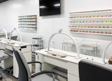 Mai Nail Salon & Spa in Appleton, Wisconsin, features sleek manicure stations and vibrant nail polish displays.