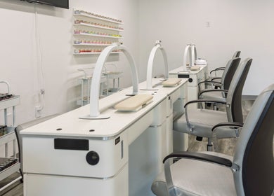Manicure stations at Mai Nail Salon & Spa in Appleton, Wisconsin, US, showcasing modern, stylish interiors.