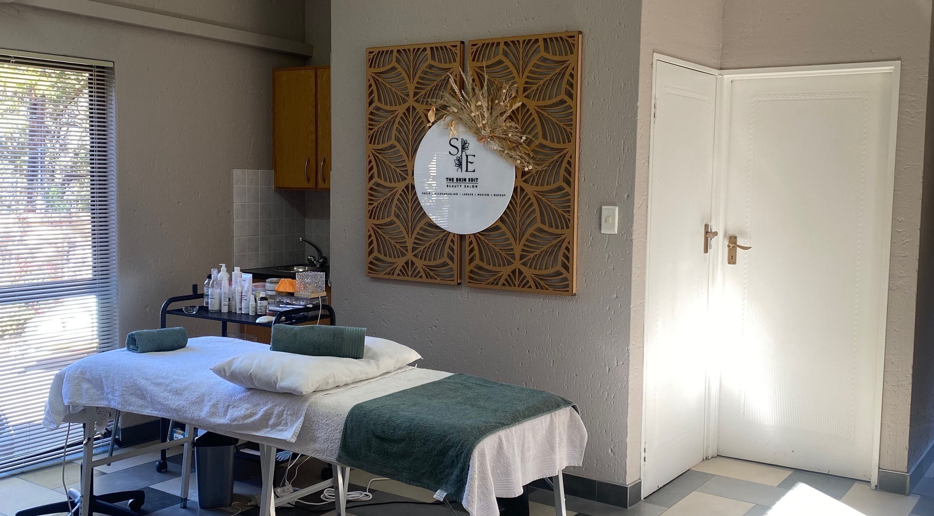 The Skin Edit therapy room in Roodepoort, Gauteng, ZA with a comfortable treatment bed and serene decor.