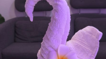 Artfully folded towel resembling a swan at KHUN MAI THAI MASSAGE in London, England, GB.