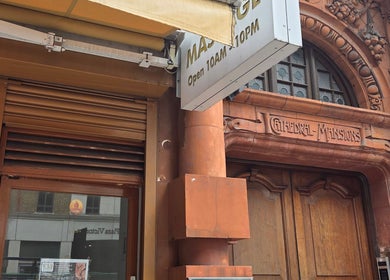 Exterior of KHUN MAI THAI MASSAGE in London, England, GB with detailed architectural elements.