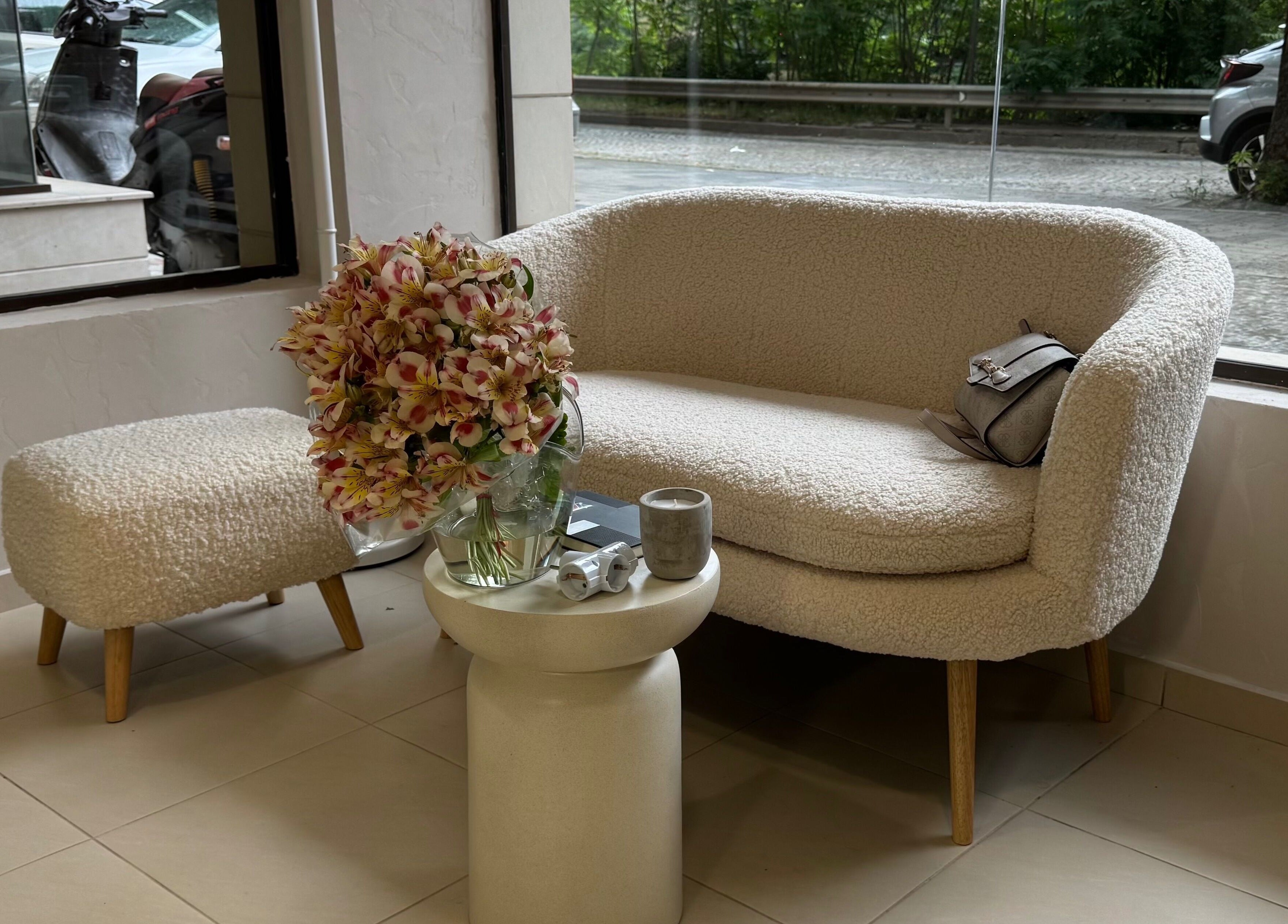 Elegant seating area at Simple by Eleonora Velinova, Sofia, Sofia City Province, BG, with flowers and decor.