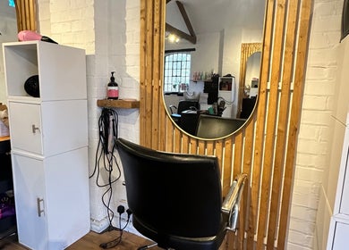 Beauty, Hair & Beyond salon chair and mirror in Stevenage, England, GB, showcasing modern stylish design.