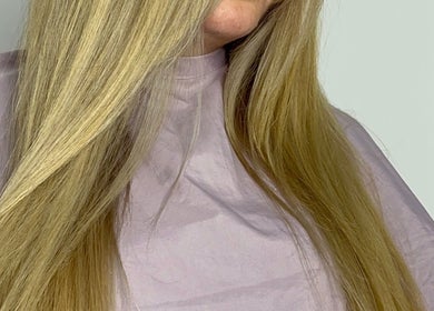 Long, sleek blonde hair styled elegantly at Hair Anthem, Flagstone, Queensland, AU.