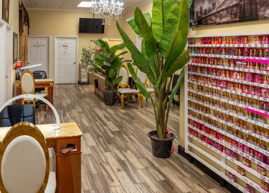 Elegant interior of VIP Nails and Spa Official in Lodi, California, US, featuring vibrant nail polish racks.