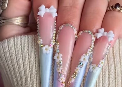 Elegant floral nail art with pastel hues at VIP Nails and Spa Official, Lodi, California, US.
