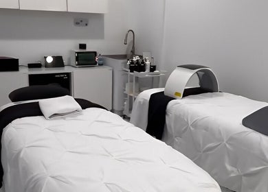 Luxurious treatment room at KaHBee by Lee, Torrance, California, US, featuring two massage tables.
