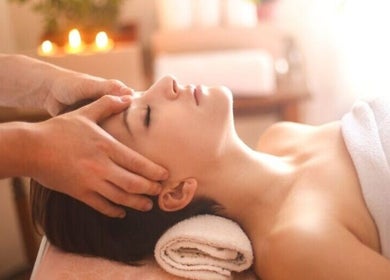 A person receiving a relaxing facial massage at KaHBee by Lee, Torrance, California, US, enhancing wellness.