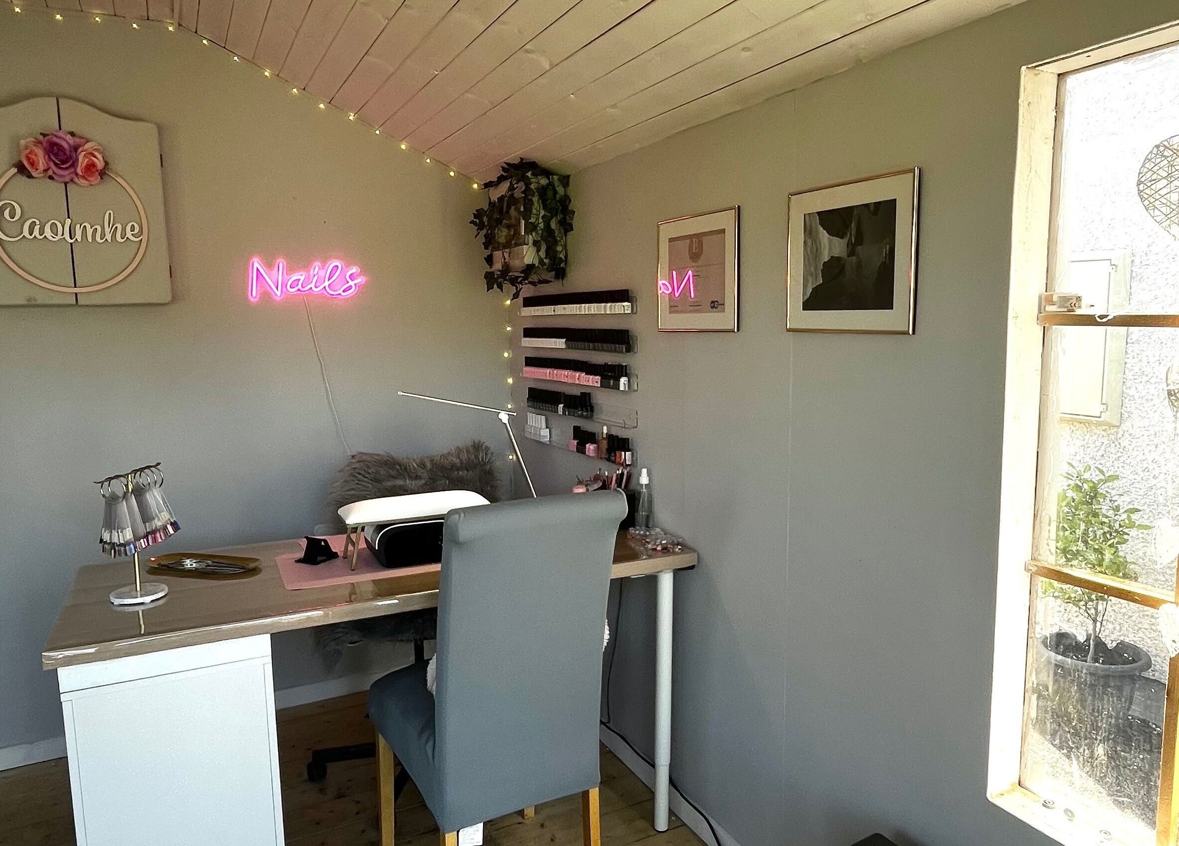 Cozy chic nail station with neon signs at Nails By Caoimhe, Castlebar, County Mayo, IE.