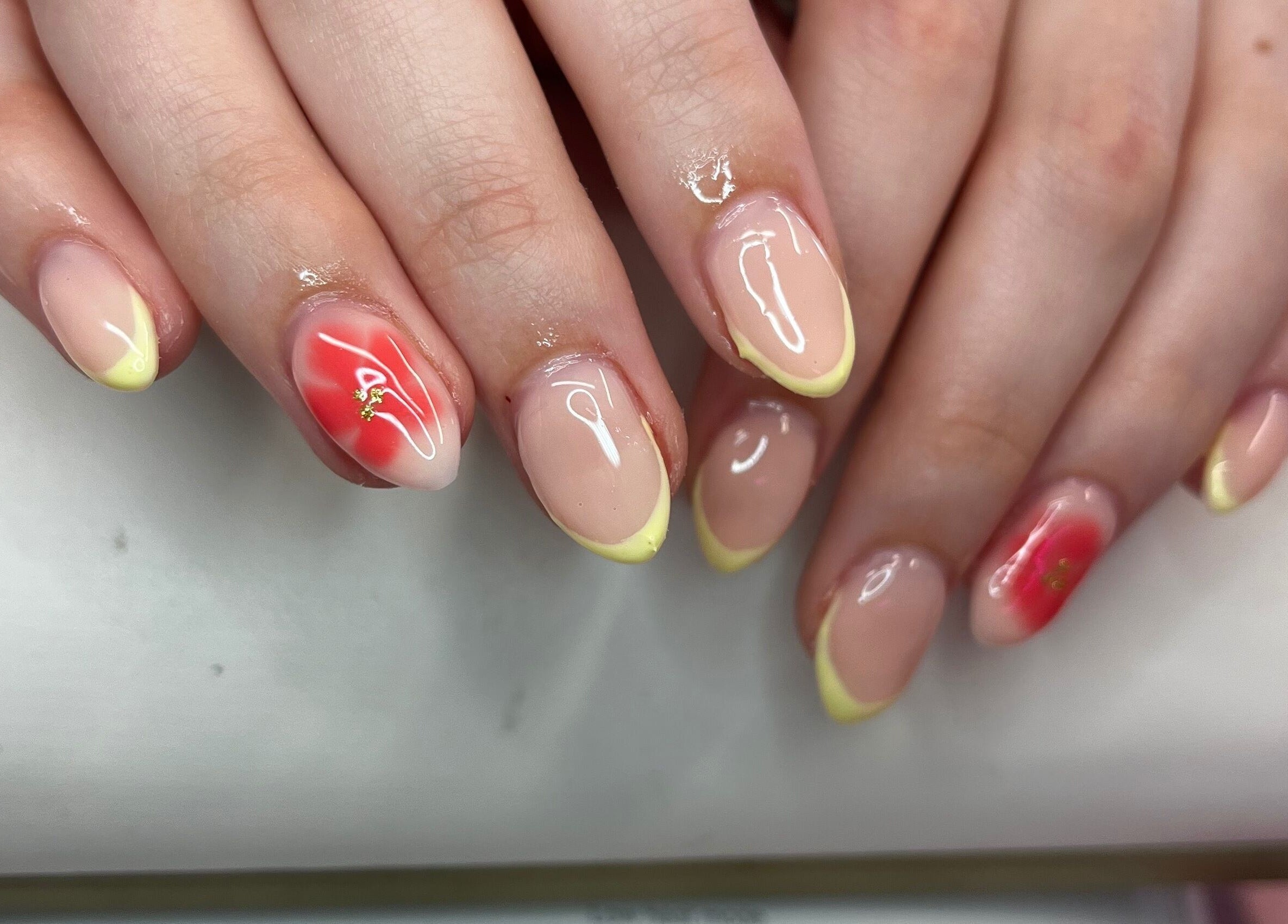 Stylish nail art with floral design at Nails By Caoimhe, Castlebar, County Mayo, IE. Perfect for summer vibes.