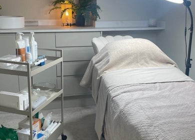 Medermica treatment room with calming decor in Bristol, England, GB, showcasing relaxation and wellness.