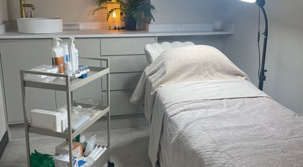 Medermica treatment room with calming decor in Bristol, England, GB, showcasing relaxation and wellness.