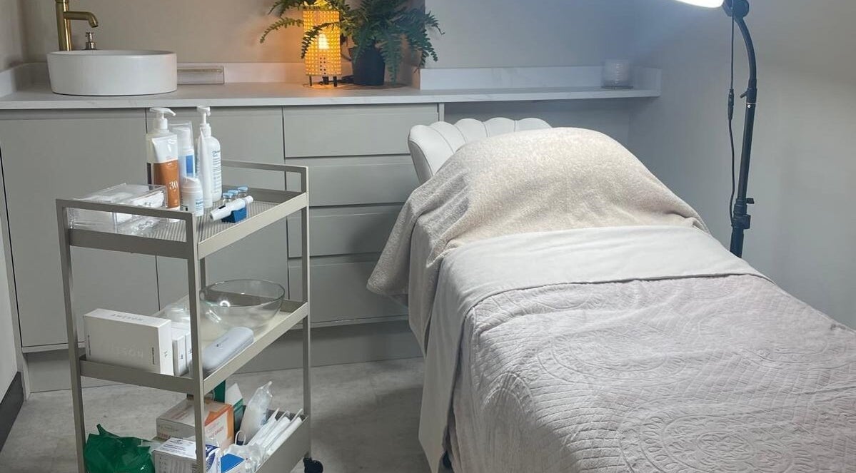 Medermica treatment room with calming decor in Bristol, England, GB, showcasing relaxation and wellness.