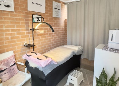 Relaxing interior of Her Lash Escape, Minto, New South Wales, AU, showcasing a comfortable lash treatment space.