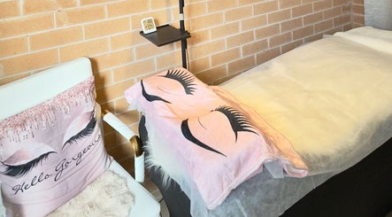 Cozy treatment area at Her Lash Escape, Minto, New South Wales, AU, with plush eyelash-themed decor.