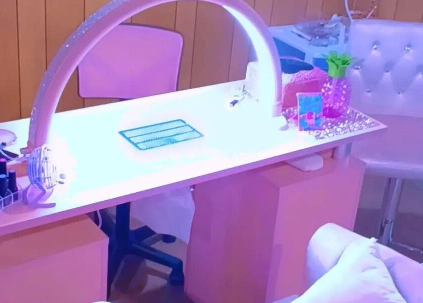 Modern nail station at AWrelax Spa in Davenport, Iowa, US offering a stylish beauty experience.