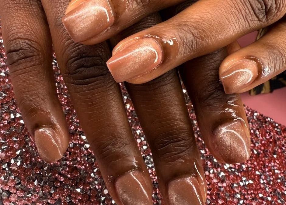 Elegant manicure at AWrelax Spa, Davenport, Iowa, US highlighting glossy, polished nails.