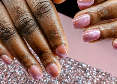 Elegant pink manicured nails at AWrelax Spa in Davenport, Iowa, US, showcasing perfect nail art.