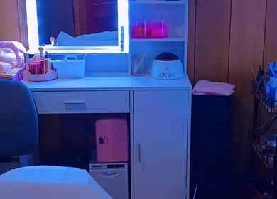 Stylish beauty station at AWrelax Spa in Davenport, Iowa, US, showcasing a modern setup with beauty essentials.