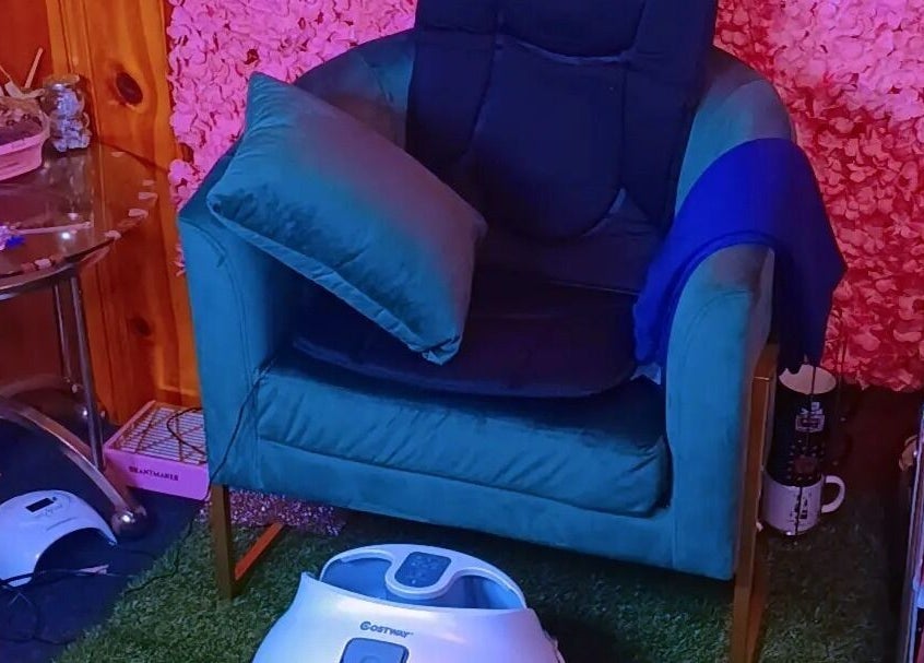 Relaxing massage chair at AW Relax Spa, Davenport, Iowa, US, offering a peaceful retreat.