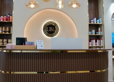 Reception area at LBL Salon, Dubai, Dubai, AE showcasing elegant design and premium products on display.