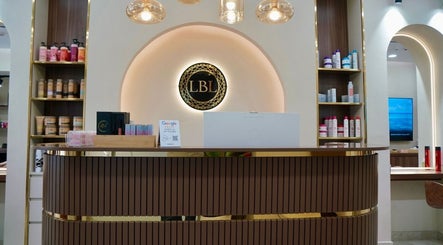 Reception area at LBL Salon, Dubai, Dubai, AE showcasing elegant design and premium products on display.