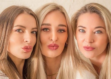 Three smiling women at Bohemian Wellness & Spa in Pretoria, Gauteng, ZA, showcasing a happy and relaxed atmosphere.