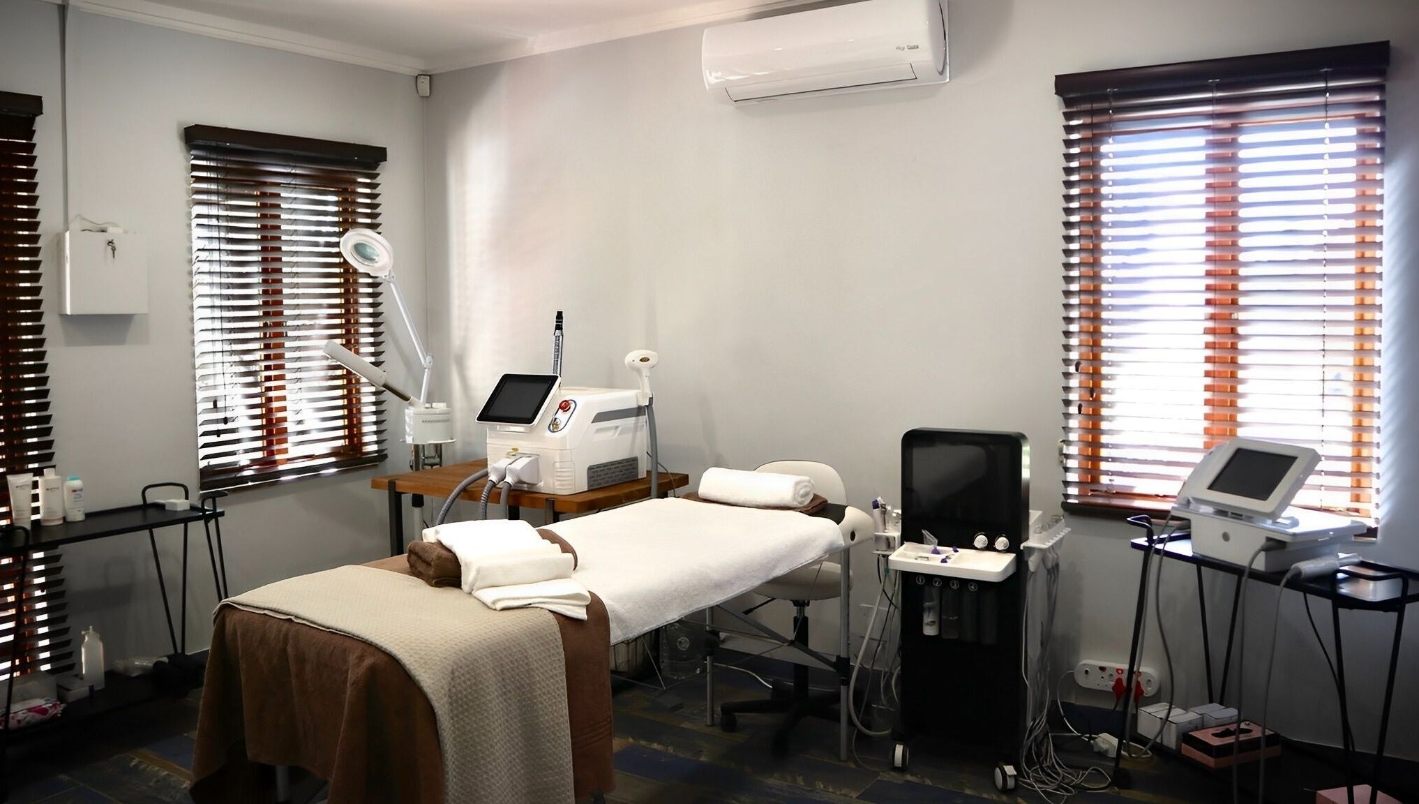 Treatment room at Bohemian Wellness & Spa in Pretoria, Gauteng, ZA, featuring a massage table and wellness equipment.