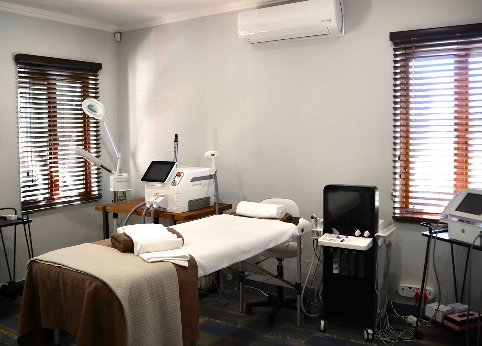 Treatment room at Bohemian Wellness & Spa in Pretoria, Gauteng, ZA, featuring a massage table and wellness equipment.