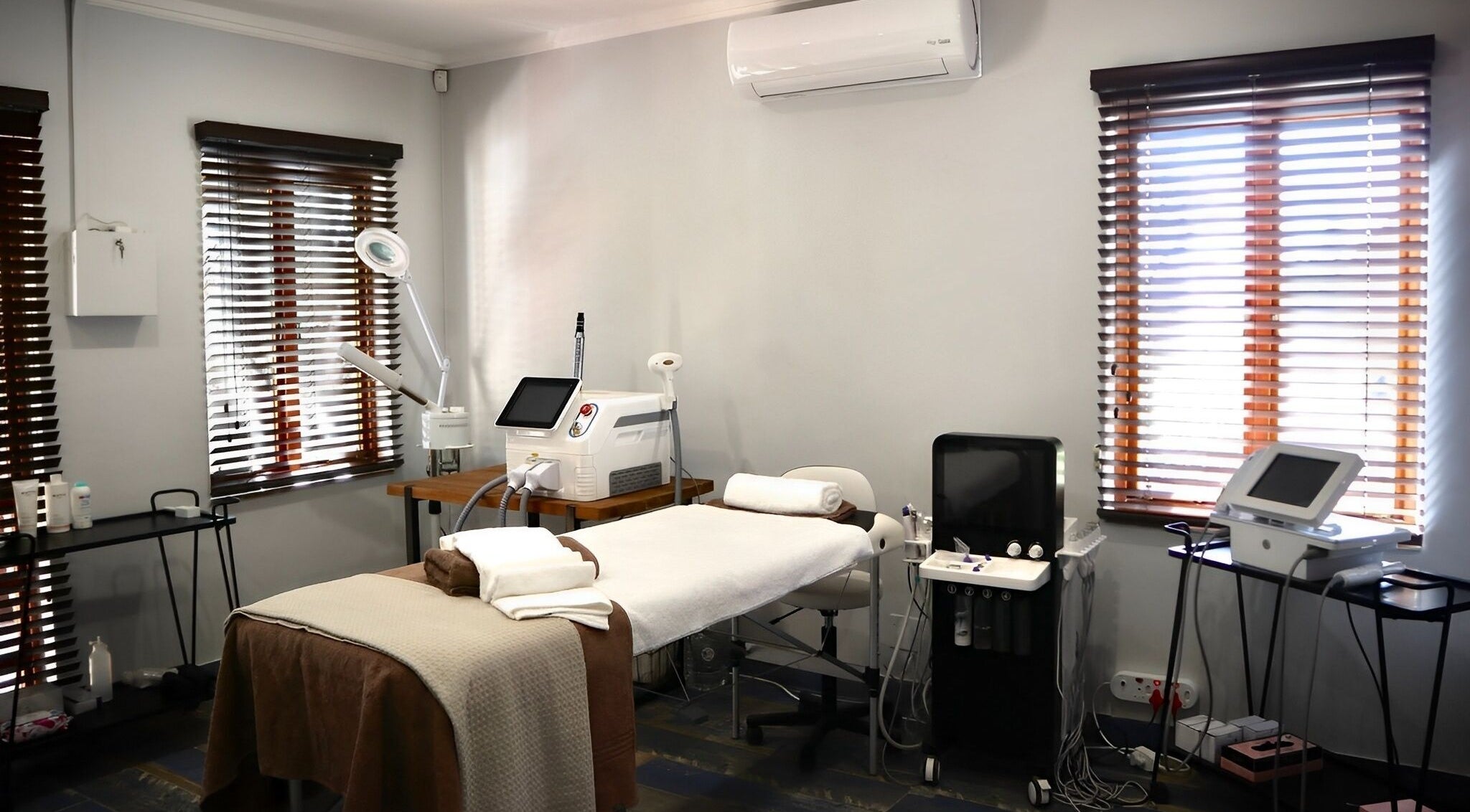 Treatment room at Bohemian Wellness & Spa in Pretoria, Gauteng, ZA, featuring a massage table and wellness equipment.