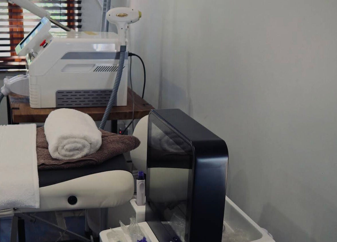 Relaxing treatment area at Bohemian Wellness & Spa, Pretoria, Gauteng, ZA with modern equipment and cozy towels.