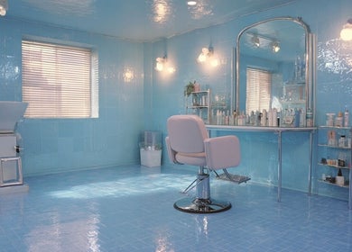Modern blue salon interior at Heaven Luxe Aesthetics, London, England, GB for premium beauty services.