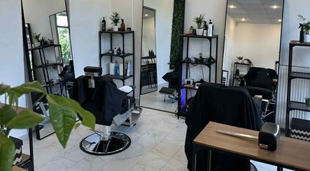 Chic interior of Újlipót Barber Shop in Budapest, Magyar, HU with stylish chairs and equipment.