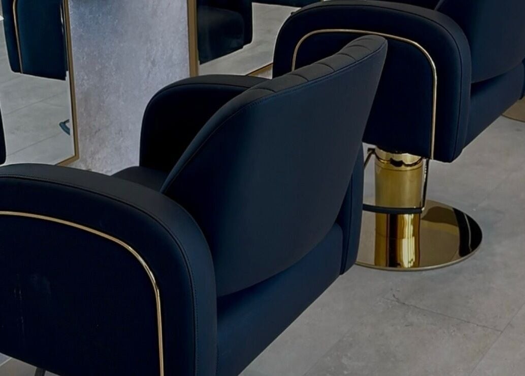Elegant black salon chairs at Solea Salon-Charisse, Motherwell, Scotland, GB, offering a luxurious experience.