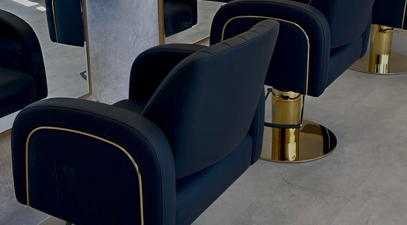 Elegant black salon chairs at Solea Salon-Charisse, Motherwell, Scotland, GB, offering a luxurious experience.