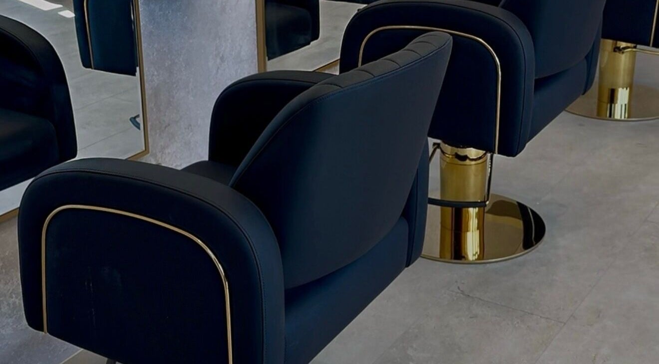 Elegant black salon chairs at Solea Salon-Charisse, Motherwell, Scotland, GB, offering a luxurious experience.