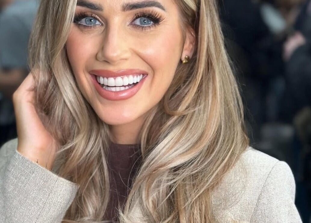 Smiling woman with styled hair at Solea Salon-Charisse, Motherwell, Scotland, GB.