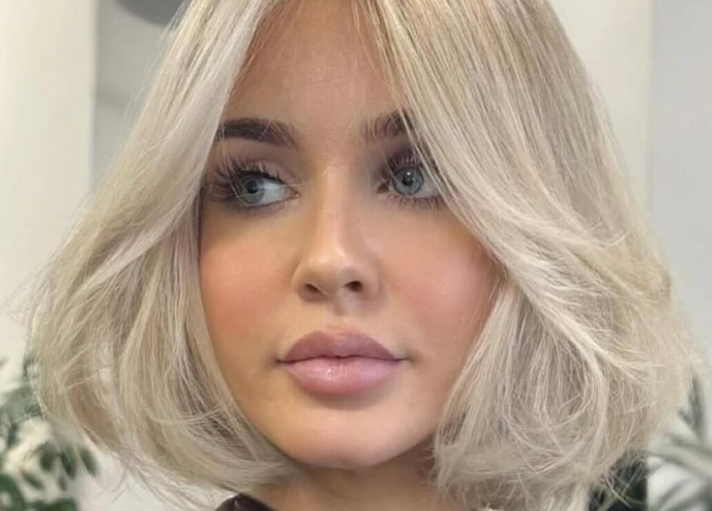 Close-up of a chic blonde bob haircut at Solea Salon- Charisse, Motherwell, Scotland, GB.