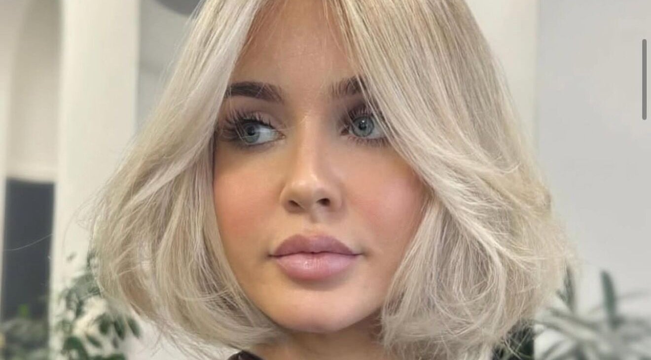 Close-up of a chic blonde bob haircut at Solea Salon- Charisse, Motherwell, Scotland, GB.