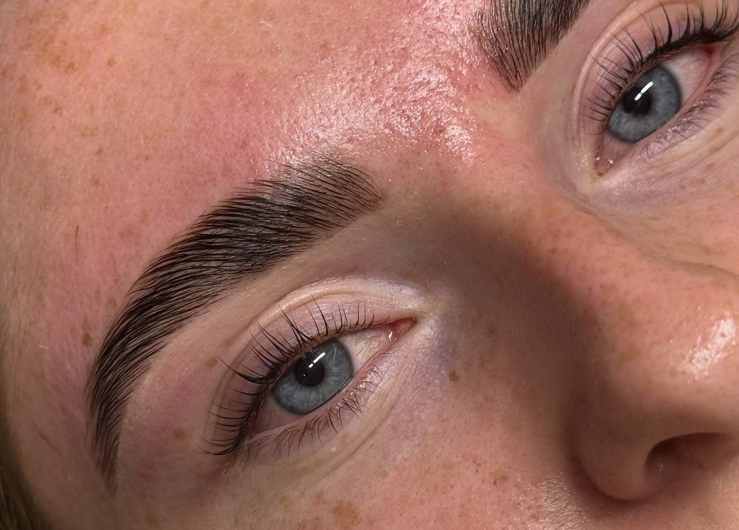 Close-up of expertly groomed eyebrows at Studio by MH, Liverpool, England, GB.