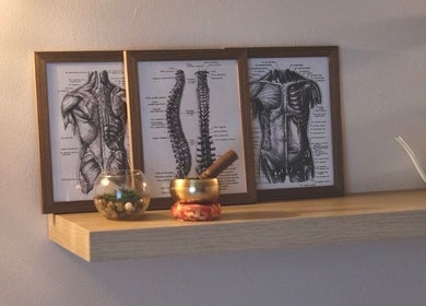 Stylish anatomical prints at Rafaëlle Rotunno Massothérapie, Pointe-claire, Québec, CA enhance serene setting.