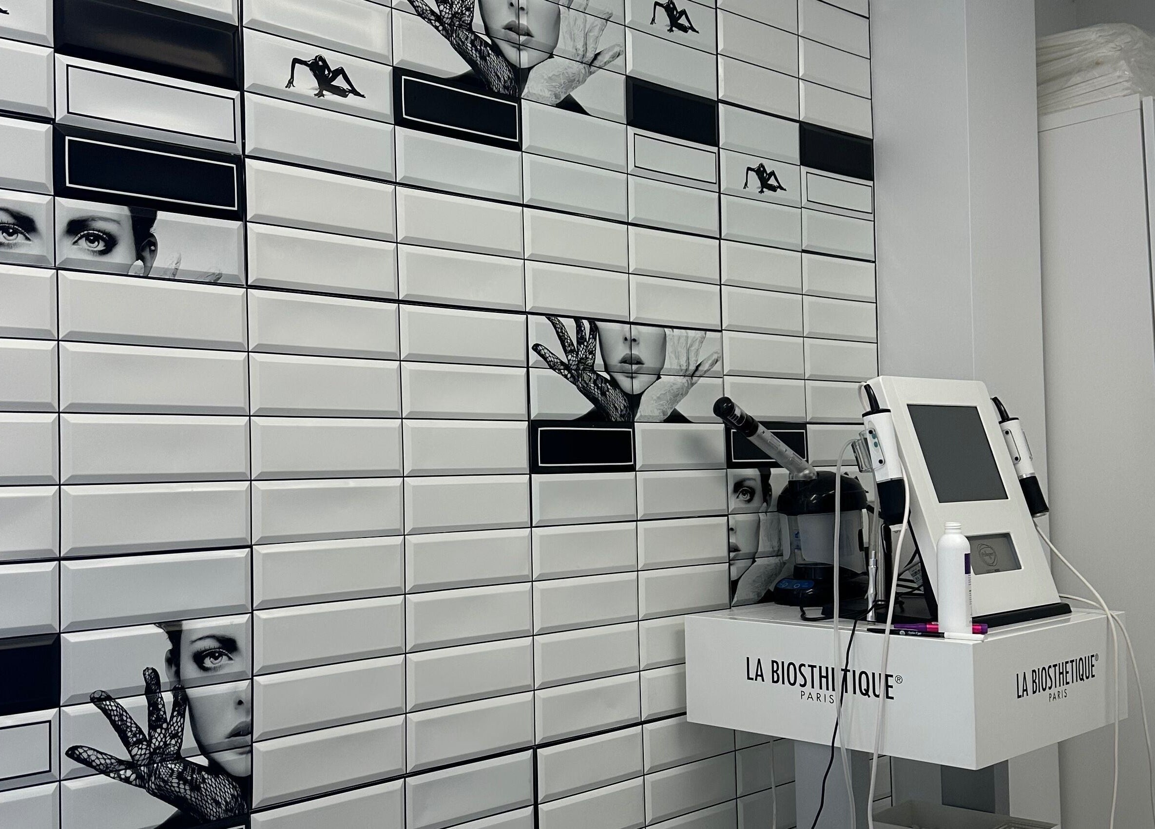 Chic decor with artful tiles and beauty equipment at LaserGlam, Laval, Québec, CA.